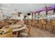 Community bar area with seating, a bar and tables at 124 Ashton Dr, Davenport, FL 33837