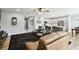 Open-concept living area showcasing a seamless transition from the living room to the kitchen with a center island at 1272 Bonita Canyon Dr, Poinciana, FL 34759