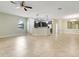 View of the kitchen showcasing dark cabinets, granite countertops, and stainless steel appliances at 1300 Island Green St, Davenport, FL 33896