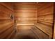 Inviting sauna room with wooden benches and paneling for a relaxing experience at 1300 Island Green St, Davenport, FL 33896