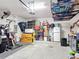Spacious garage with storage solutions and ample room for vehicles at 140 Trinity Ridge Cir, Davenport, FL 33897