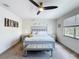 Well-lit bedroom with soft lighting and decorative touches creating a relaxing retreat at 1425 Serendipity Ln, Clermont, FL 34714