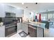 Sleek kitchen boasts modern appliances, minimalist cabinets, and ample counter space, perfect for cooking at 1425 Serendipity Ln, Clermont, FL 34714