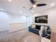 Spacious upstairs loft with comfortable seating, stylish decor, and ample lighting at 1425 Serendipity Ln, Clermont, FL 34714