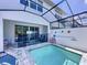 Private screened-in pool area, perfect for relaxation and outdoor enjoyment at 1425 Serendipity Ln, Clermont, FL 34714