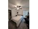 Bedroom with a ceiling fan, closet, and natural light at 2034 Old Pasture Ln, Lakeland, FL 33801