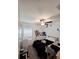 Cozy bedroom with a ceiling fan and a bright window at 2034 Old Pasture Ln, Lakeland, FL 33801