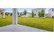 View of a spacious backyard with a newly laid lawn, perfect for outdoor activities and relaxation at 232 Flag Lilly Ln, Umatilla, FL 32784
