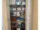 Linen closet with wire shelving and ample storage space for linens, towels, and household supplies at 240 Steamboat Blvd, Davenport, FL 33897