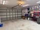 A spacious two car garage providing ample space for vehicles and storage at 240 Steamboat Blvd, Davenport, FL 33897