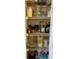 Organized pantry featuring wire shelves filled with an assortment of food and kitchen supplies at 240 Steamboat Blvd, Davenport, FL 33897