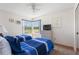 Comfortable bedroom with twin beds, natural light, and carpet floors at 2438 Sweetwater Club Cir # 50, Kissimmee, FL 34746