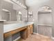 Bathroom vanity with lots of counter space leading to main bedroom at 265 Curtis Ave, Groveland, FL 34736