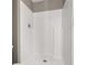 Bathroom shower with white tiled walls at 265 Curtis Ave, Groveland, FL 34736