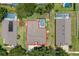 Aerial view of the property, showcasing its location within a community with a private pool at 3125 Samosa Hill Cir, Clermont, FL 34714