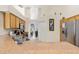 Kitchen featuring stainless steel appliances, ample countertop space and wood cabinets at 3125 Samosa Hill Cir, Clermont, FL 34714