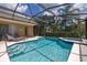 Stunning screened-in pool with spa and lounge chairs, ideal for Florida living at 3125 Samosa Hill Cir, Clermont, FL 34714