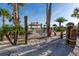 Community sand area featuring a hammock, lake view, and covered gazebo at 3150 Paradox Cir # 104, Kissimmee, FL 34746