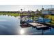 A lake with a covered viewing point and small slide into the water, with canoes available at 3150 Paradox Cir # 104, Kissimmee, FL 34746