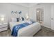 This bedroom features a king size bed and ensuite bathroom with glass enclosed shower at 3150 Paradox Cir # 104, Kissimmee, FL 34746