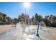 A community splash pad offers a fun and refreshing experience on a sunny day at 3150 Paradox Cir # 104, Kissimmee, FL 34746