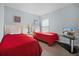 Bedroom with two twin beds, a nightstand, and a TV with view of the home at 321 Rosso Dr, Davenport, FL 33837