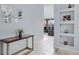 A foyer showcases tile flooring and decor shelves leading into the main living areas at 321 Rosso Dr, Davenport, FL 33837