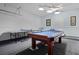 Spacious game room featuring a pool table and ping pong table for entertainment at 321 Rosso Dr, Davenport, FL 33837