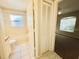 Functional bathroom features a shower-tub combo and neutral tiling at 3370 Cypress Point Cir, St Cloud, FL 34772