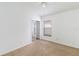 Bedroom featuring carpeted floors, a closet and window views at 3370 Cypress Point Cir, St Cloud, FL 34772