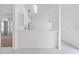 Bright kitchen area with white cabinets, neutral countertops, and tile flooring at 3370 Cypress Point Cir, St Cloud, FL 34772