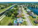 Aerial view showcasing the home's location within the neighborhood and proximity to the community waterway at 3893 Blackberry Cir, St Cloud, FL 34769