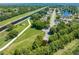 Beautiful aerial view of a home in a scenic community with canals and lake access at 3893 Blackberry Cir, St Cloud, FL 34769