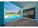 View of the pool and screened enclosure at 3893 Blackberry Cir, St Cloud, FL 34769