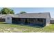 The backyard features a screen enclosed lanai providing an ideal space for entertaining at 408 Sandpiper Ridge Dr, Orlando, FL 32835