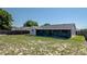 Spacious backyard featuring a screen enclosed lanai area perfect for outdoor entertaining and relaxation at 408 Sandpiper Ridge Dr, Orlando, FL 32835