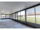 Screened lanai showcasing expansive views, providing an ideal space for relaxing and enjoying the outdoors at 408 Sandpiper Ridge Dr, Orlando, FL 32835