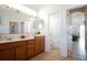 Clean bathroom with double vanity, offering ample space for getting ready in the morning at 426 Prestwick Dr, Davenport, FL 33897