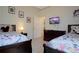 Inviting bedroom featuring twin beds with themed bedding, creating a fun and restful space at 426 Prestwick Dr, Davenport, FL 33897