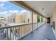 Spacious outdoor balcony featuring architectural pillars with a view of the building and blue skies at 438 Water St # 438, Celebration, FL 34747