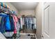 This closet is a clothing organizer's dream, with rods, shelves, and space for shoe storage at 438 Water St # 438, Celebration, FL 34747