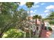 Elevated view of a home and community shows townhome exteriors, walkway and lawns at 438 Water St # 438, Celebration, FL 34747