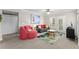 Comfortable living room area with modern sofa and colorful accents at 438 Water St # 438, Celebration, FL 34747