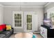 Inviting living room with large windows and a decorative entertainment console at 438 Water St # 438, Celebration, FL 34747