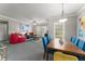 Spacious living room and dining area with neutral colors and lots of natural light at 438 Water St # 438, Celebration, FL 34747