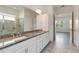 Beautiful bathroom with granite countertops and a glass-enclosed shower at 5009 E Fountainwood Dr, St Cloud, FL 34772