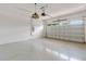 Spacious garage with an automatic door and a retro pendant light at 5009 E Fountainwood Dr, St Cloud, FL 34772