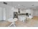 Bright, modern kitchen with stainless steel appliances, granite countertops and center island at 5009 E Fountainwood Dr, St Cloud, FL 34772