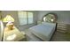Large bedroom featuring a full bed with tile floors and windows at 501 Kilimanjaro Dr, Kissimmee, FL 34758
