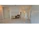 Bright living space featuring tile floors and views into other areas of the home at 501 Kilimanjaro Dr, Kissimmee, FL 34758